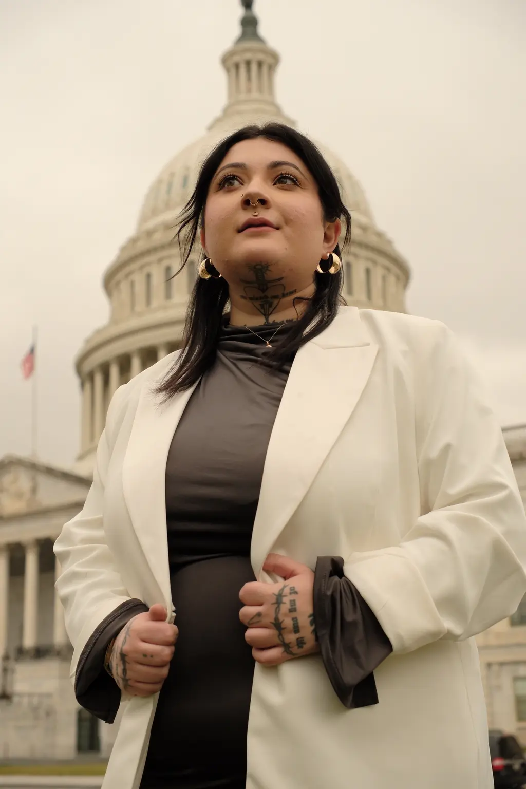 Leah outside of the U.S. Capitol after speaking at the Senate Judiciary Committee press conference on regulating Big Tech in Washington, DC (2024). Courtesy Leah Juliett.
