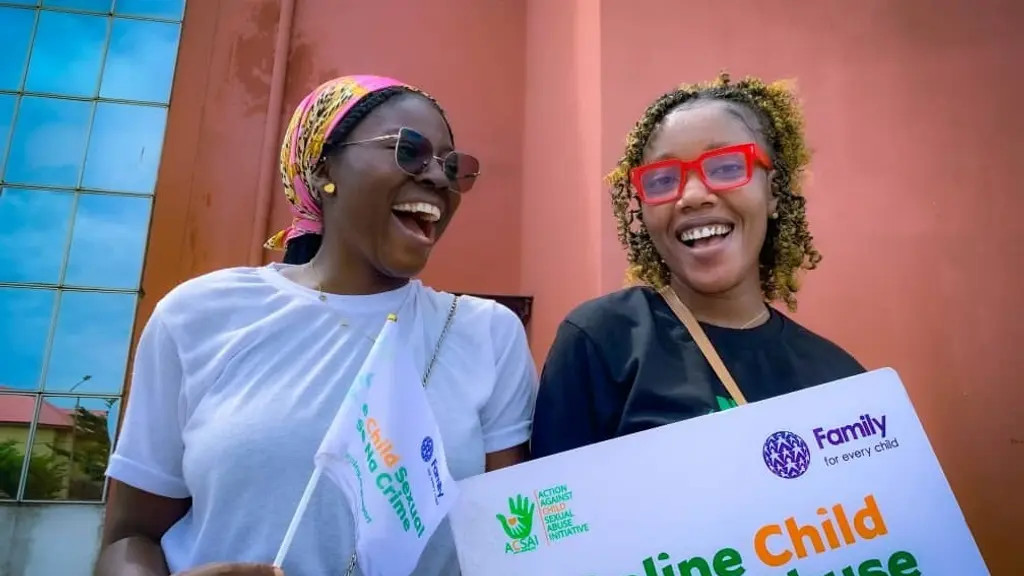 ACSAI youth with cards