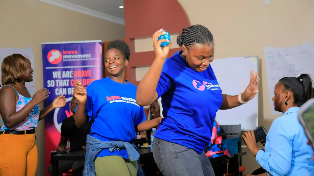 Brave Movement allies dancing during a wellbeing session, Uganda