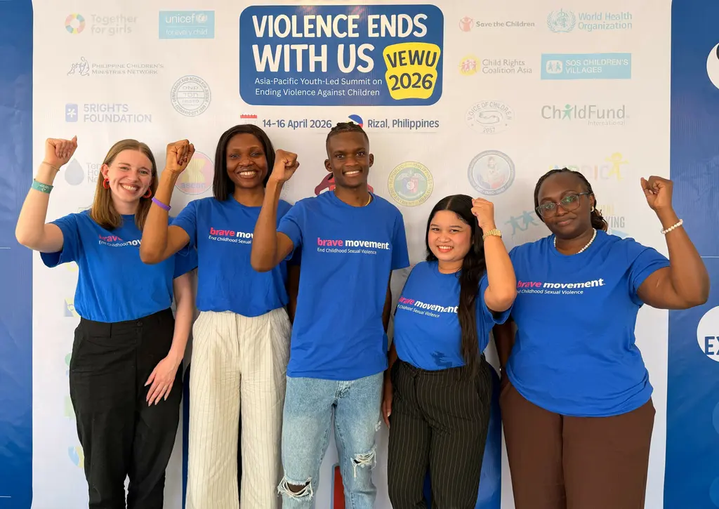 Youth advocate Keegan Kagwe (center) alongside members of the Violence Ends with Us summit delegation.