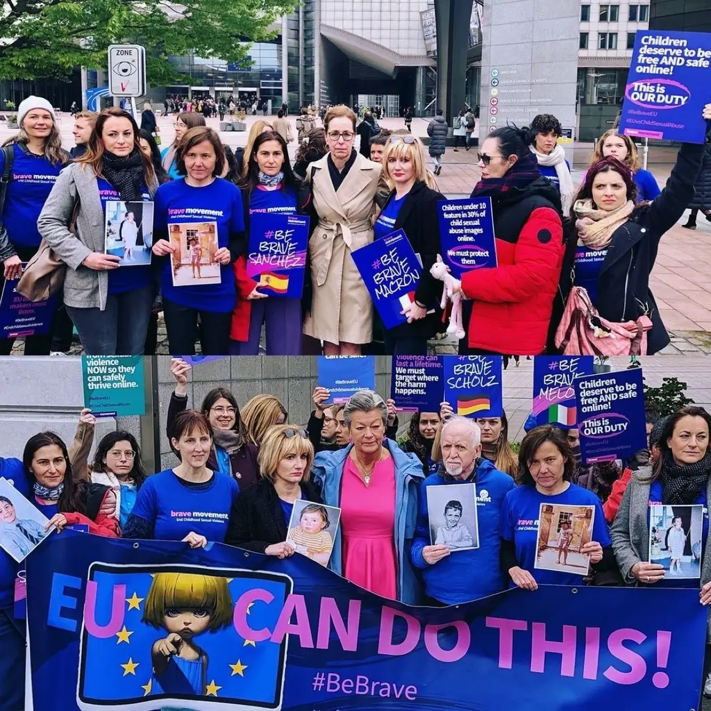 Group of people, mostly women, holding up signs and placards at a protest rally. Prominent blue and white colors, as well as a banner that reads "EU, WE CAN DO THIS! #BeBrave".