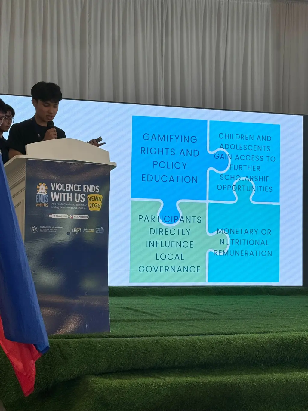 Youth-led teams present their ideas at the summit.