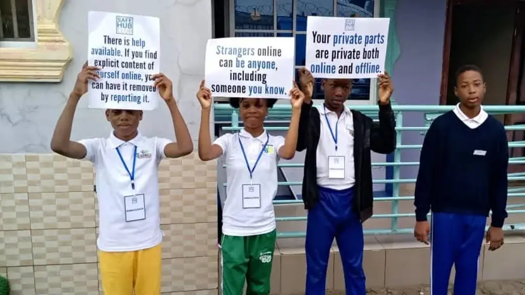 ACSAI youth with cards