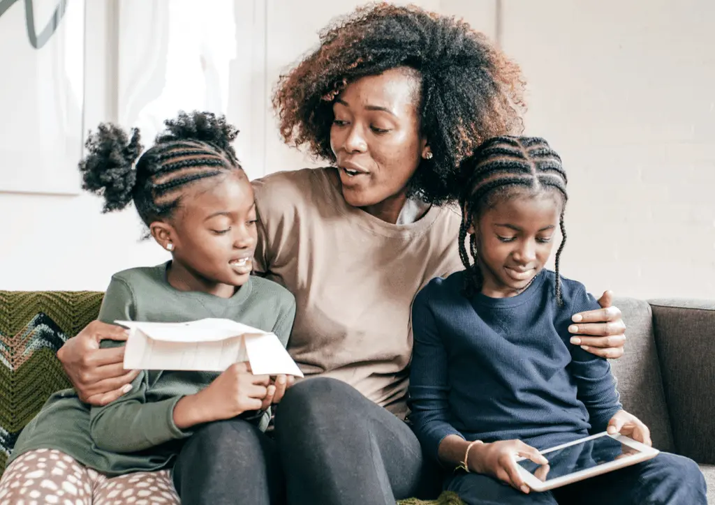 Mother and kids with devices